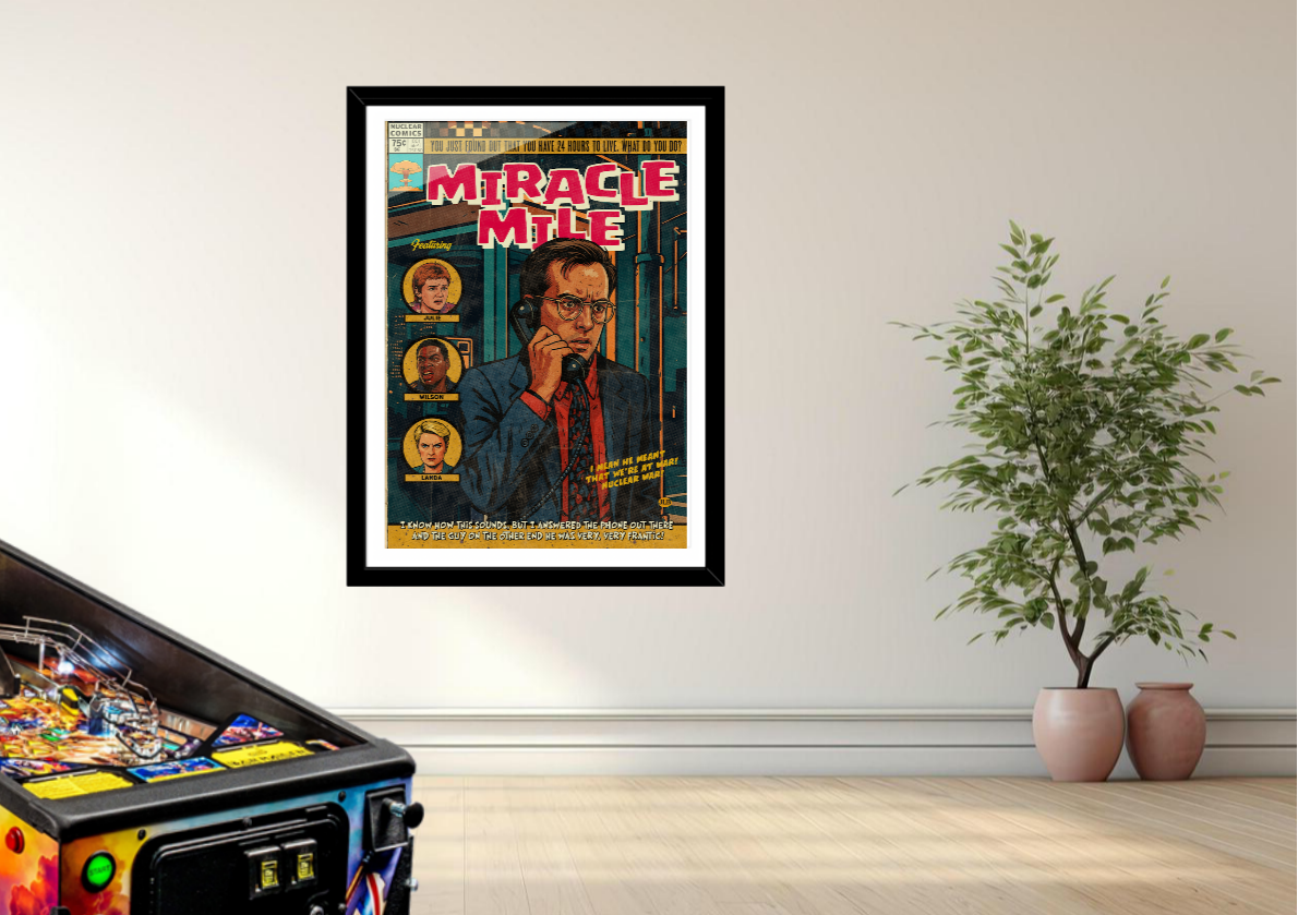 Framed comic book-style poster titled 'Miracle Mile' on a wall next to a pinball machine and potted plants.