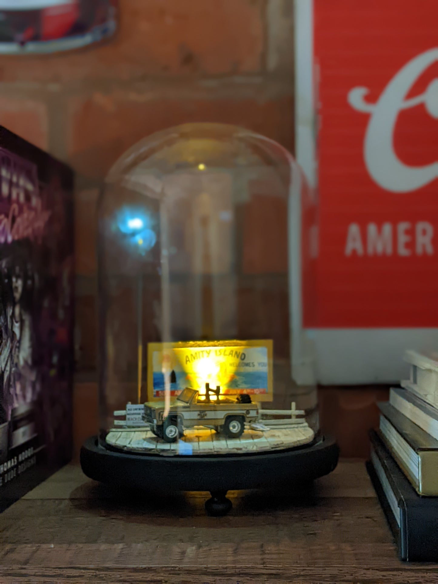 Unique handmade movie collectible lamp inspired by Jaws displayed on a shelf in home decor setting.