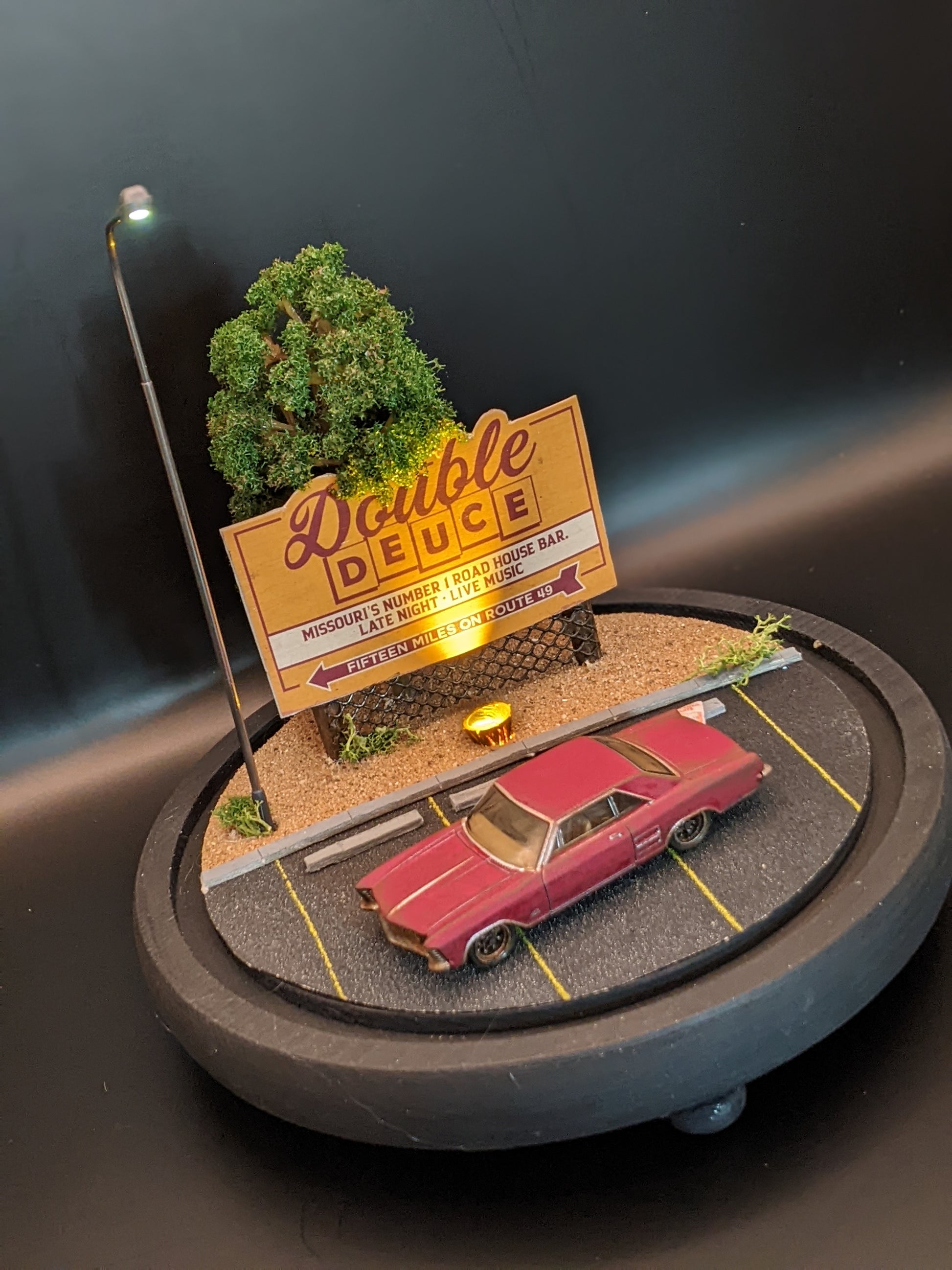 Limited edition bell jar lamp showing detailed miniature scene from a classic movie.